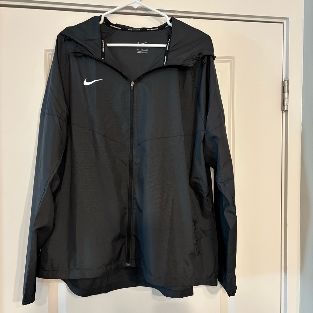 Nike Women’s Running Windbreaker. Size XXL. Worn once - Like new. Dark Grey.